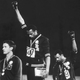 U.S. track-and-field athletes Tommie Smith (center) and John Carlos, first- and third-place winners in the 200-meter race, protest with the black power salute as they stand on the winner’s podium at the Summer Olympic Games in Mexico City on Oct. 19, 1968. Australian silver medalist Peter Norman stands by.
JOHN DOMINIS/THE LIFE PICTURE COLLECTION/GETTY IMAGES